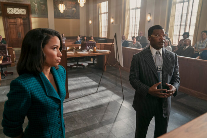 Jurnee_Smollett_as_Mame_Downes_and_Jamie_Foxx_as_Willie_Gary_in The Burial