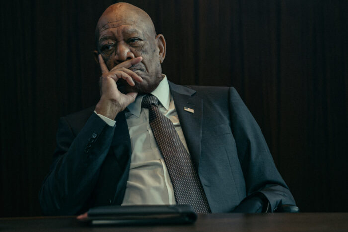 Morgan Freeman as Secretary of State Mullins