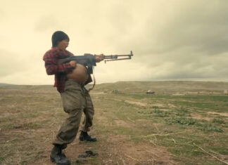 15 New Movies Coming To Theaters In September 2025 Teyana-Taylor-Firing-Gun-One-Thing-After-Another-Trailer