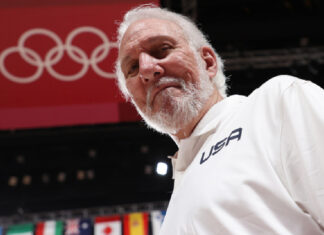 Gregg Popovich Steps Down As Spurs Coach, Transitions Into President Role Gregg Popovich on the sidelines during a San Antonio Spurs game before stepping down as head coach.