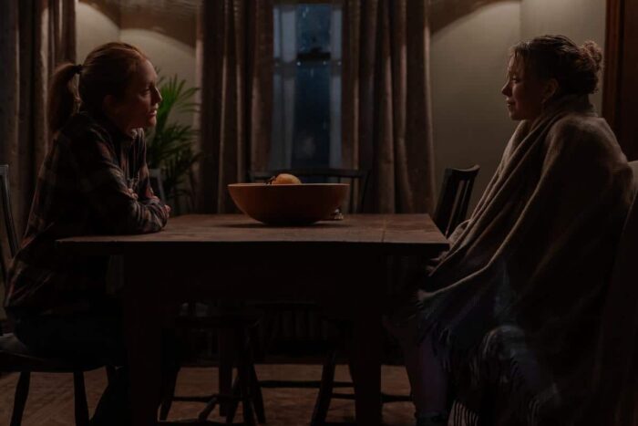 Julianne Moore and Sydney Sweeney share a tense moment in Echo Valley, streaming June 13, 2025 on Apple TV+.