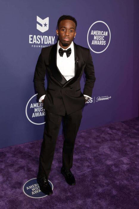 Kai Cenat on the purple carpet at the 2025 AMAs