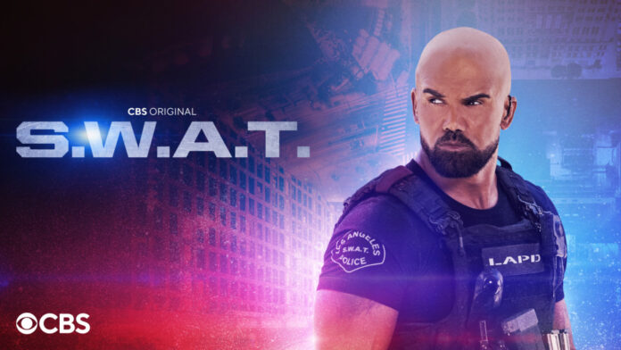 Shemar Moore smiles while addressing fans in a video announcing his return as Hondo in the CBS spinoff series "S.W.A.T. Exiles"