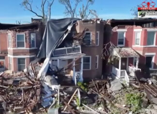St. Louis Tornado Disaster: Sirens Fail, Lives Lost—The Shocking Failure That Left A City Defenseless St. Louis residents caught in the aftermath of the deadly tornado, highlighting the failure of the city's tornado siren system.