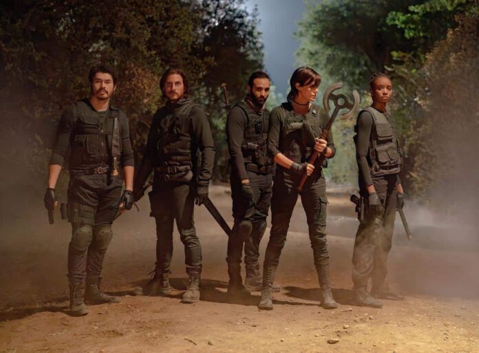 Tuah, Nicky, Joe, Andy, and Nile unite in a team shot from The Old Guard 2 on Netflix.