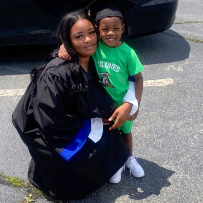 Adriana Smith posing with her 7-year-old son