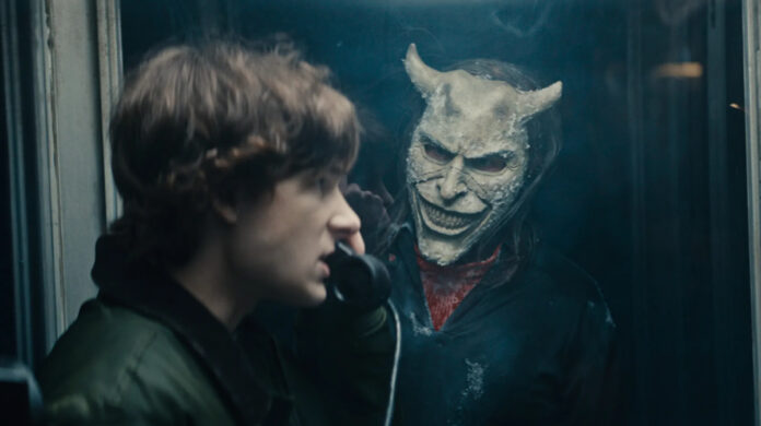 Mason Thames as Finn and Ethan Hawke as The Grabber in Black Phone 2.