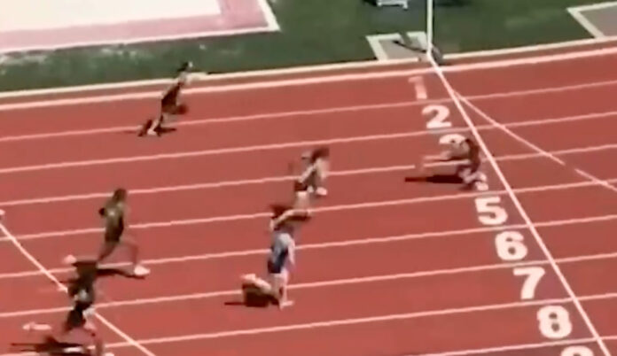 Brooklyn Anderson somersaulting over the finish line to win at the OSAA State Track and Field Championships in Eugene, Oregon