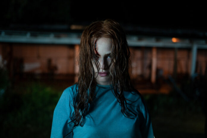 Madelaine Petsch as Maya in The Strangers - Chapter 2, facing a terrifying new chapter of horror and relentless pursuit.
