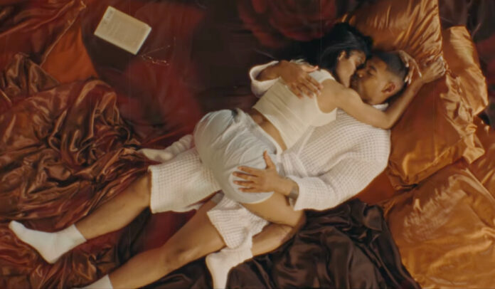 Teyana Taylor and Aaron Pierre in the “Bed of Roses” music video, narrated by Issa Rae