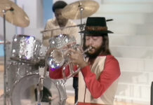 Chuck Mangione, Beloved Jazz Legend & ‘Feels So Good’ Hitmaker, Passes Away At 84 Chuck Mangione performing with his flugelhorn, wearing his signature hat