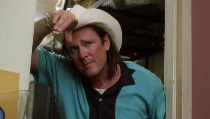 Michael Madsen as Budd in Kill Bill Vol. 2, wearing a cowboy hat.