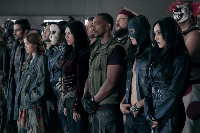 Richard de Klerk, Saylor Bell Curda, Tiana Okoye, Stephanie Beatriz, Anthony Mackie, and Mike Mitchell appear together in a cast group shot from "Twisted Metal" Season 2.