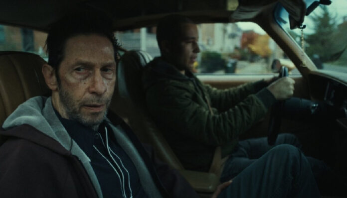 Tim Blake Nelson as retired boxer Bernard "Bang Bang" Rozyski in the sports drama Bang Bang
