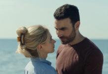 What If A Soulmate Test Broke Your Heart? ‘All Of You’ Trailer Will Wreck You Imogen Poots and Brett Goldstein in a scene from All Of You, premiering in select theaters and on Apple TV+ September 26, 2025.