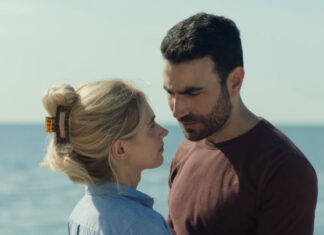 What If A Soulmate Test Broke Your Heart? ‘All Of You’ Trailer Will Wreck You Imogen Poots and Brett Goldstein in a scene from All Of You, premiering in select theaters and on Apple TV+ September 26, 2025.