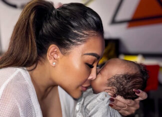 Rada Darling Clarifies Her ‘Walking Alone’ Post About Postpartum Depression Rada Darling snuggles with her baby boy while addressing postpartum depression comments