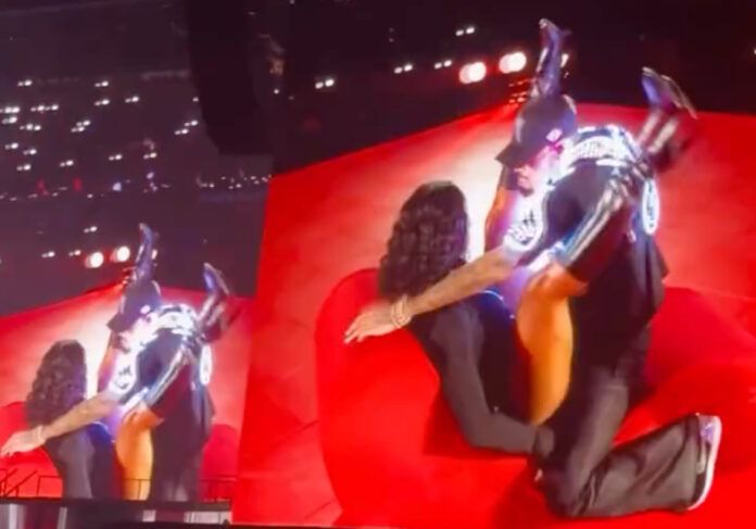 Kayla Nicole on stage with Chris Brown at the Breezy Bowl in Los Angeles