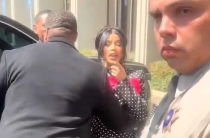 Cardi B scolding a reporter outside courthouse after winning civil assault trial