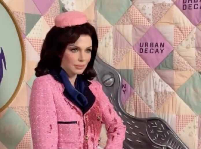 Julia Fox wearing a pink blood-stained Jackie Kennedy-inspired Halloween costume Julia Fox wearing a pink blood-stained Jackie Kennedy-inspired Halloween costume