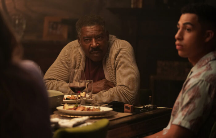 Ernie Hudson as Reverend Peters and Marcus Scribner as Jonah Silver on "Boston Blue"