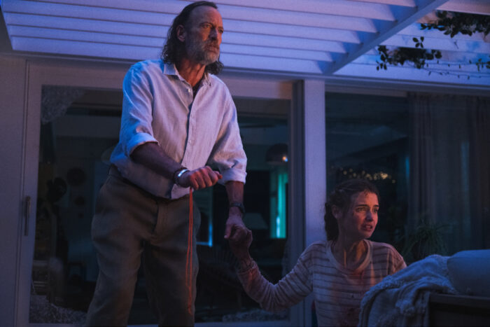Troy Kotsur as “Adam" and Gia Hunter as “Erin” in Primate from Paramount Pictures.