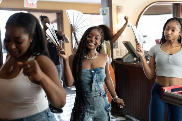 First look photo from Tubi’s “Mo’ Waffles” featuring the cast inside the Atlanta diner