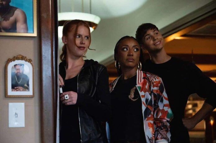 First look photo from Tubi’s “Mo’ Waffles” featuring the cast inside the Atlanta diner