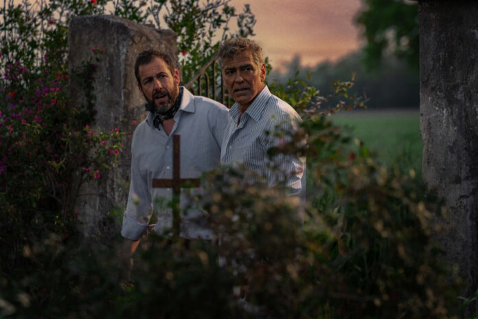 L-R) Adam Sandler as Ron Sukenick and George Clooney as Jay Kelly in Jay Kelly.
