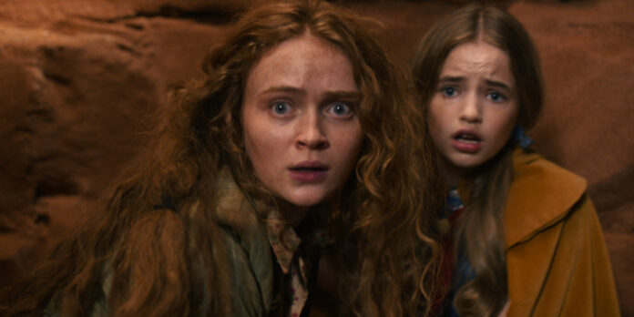 (L to R) Sadie Sink as Max Mayfield and Nell Fisher as Holly Wheeler in Stranger Things: Season 5.