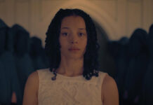 Hulu Releases First-Look Photos From ‘The Testaments’ Ahead Of Its April Premiere Chase Infiniti in a first look photo from Hulu series “The Testaments.”
