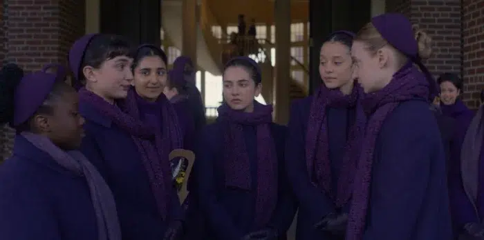 Shechinah Mpumlwana, Rowan Blanchard, Birva Pandya, Mattea Conforti, Chase Infinity, and Isolde Ardies in a group scene from Hulu’s “The Testaments.”