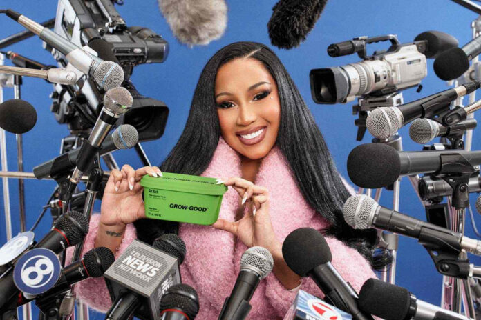 Cardi B showcasing Grow-Good Beauty haircare products while promoting her new haircare brand