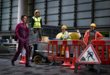 ‘Ladies First’ Trailer Flips The Script On Power And Gender Role Sacha Baron Cohen as Damien Sachs in “Ladies First” (2026) on Netflix