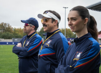‘Ted Lasso’ Season 4 Release Date And Big Story Shift Jason Sudeikis as Ted Lasso stands with coaching staff on the field in Ted Lasso Season 4 on Apple TV