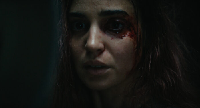 Souheila Yacoub as Alice in “Evil Dead Burn” 2026 horror film poster