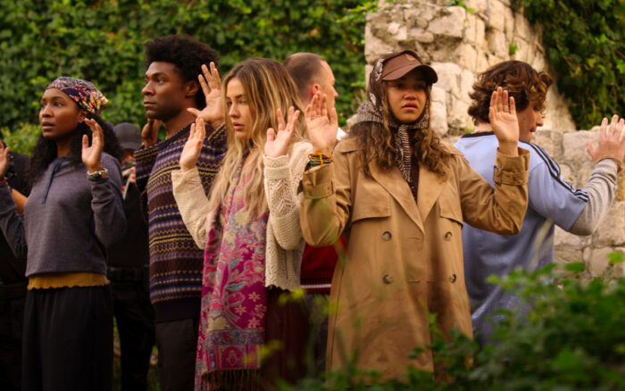 Outer Banks Season 5 cast photo featuring Carlacia Grant as Cleo, Jonathan Daviss as Pope, Madelyn Cline as Sarah Cameron, Drew Starkey as Rafe, Madison Bailey as Kiara, and Chase Stokes as John B in Episode 503.