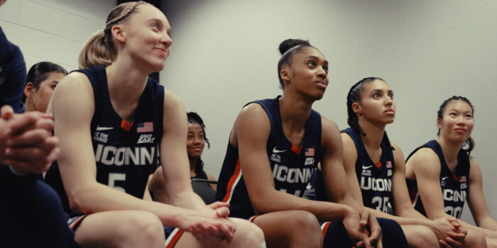 The UConn women's basketball team in "The Dynasty: UConn Huskies," premiering August 21, 2026, on Apple TV.