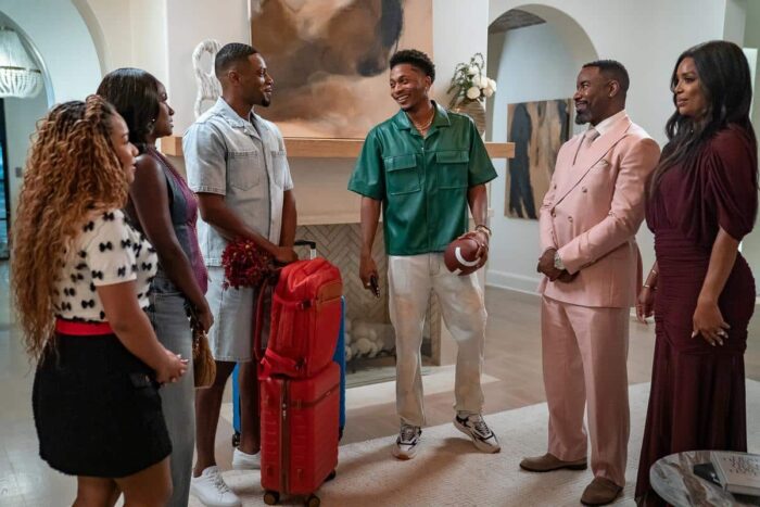 Laya Deleon Hayes as Kenya, Armani Greer as Jasmine, Everett Osborne as Wesley, Da'Vinchi as Marcus Jr., Michael Jai White as Marcus, and Tasha Smith as Angela in "Why Did I Get Married Again?" on Netflix.